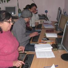 Citizens learning computer and e-government skills in their local library.