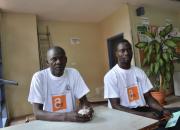 Open access team from the University Cheikh Anta Diop de Dakar (UCAD) in Senegal waits to speak to students during International Open Access Week celebrations on October 23. Photo courtesy of Mandiaye Ndiaye.