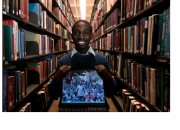 Young man in a library