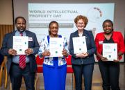 Teresa Hackett (EIFL) and colleagues holding copies of the Kenyan edition of ‘Getting Started. Implementing the Marrakesh Treaty for persons with print disabilities’ during the launch ceremony.