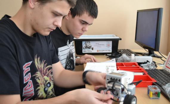 Students create programming to bring robots to life. Students create programming to bring robots to life.