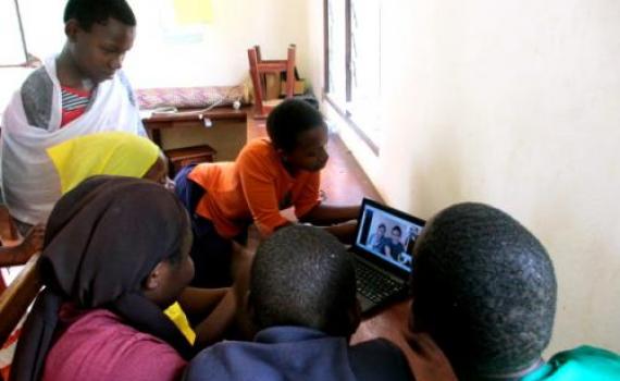 Deaf children chat to friends in Canada using Skype. Deaf children chat to friends in Canada using Skype.