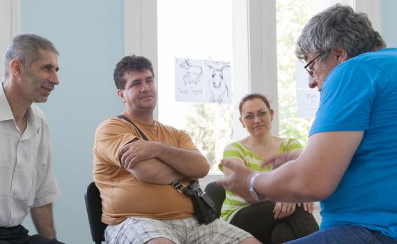 A successful library trainee shows other trainees how to behave in a job interview.